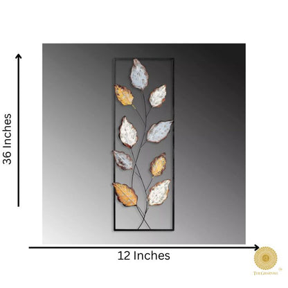 Metallic leaf wall art by The Gharnish, 12x36 inches, featuring shiny gold and silver leaf design for modern home decor.
