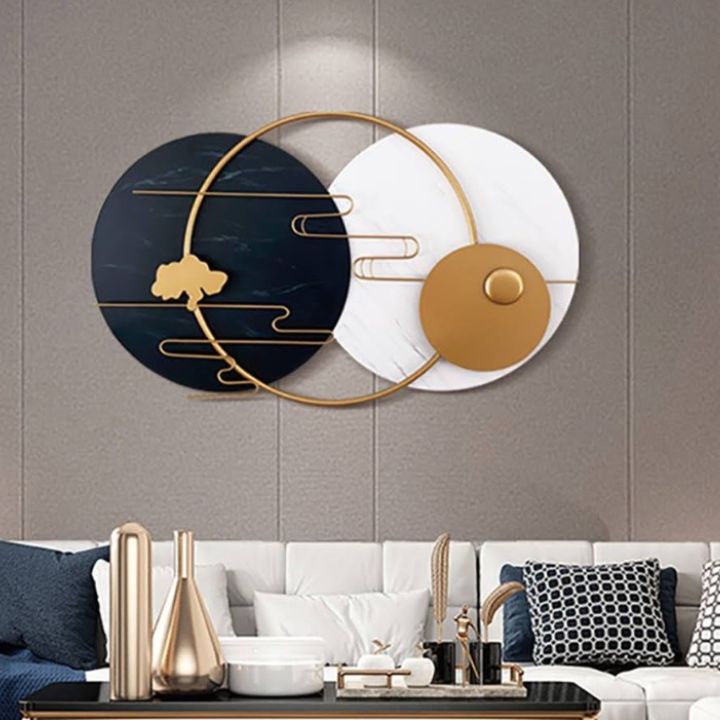 Metallic musical rings plates wall art by The Gharnish, featuring circular abstract design for modern home decor.