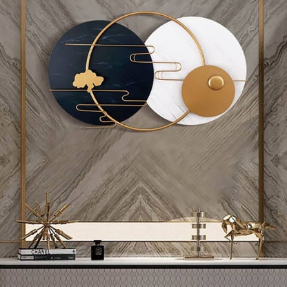 Metallic musical rings plates wall art by The Gharnish featuring circular, shiny metal art for wall decor.