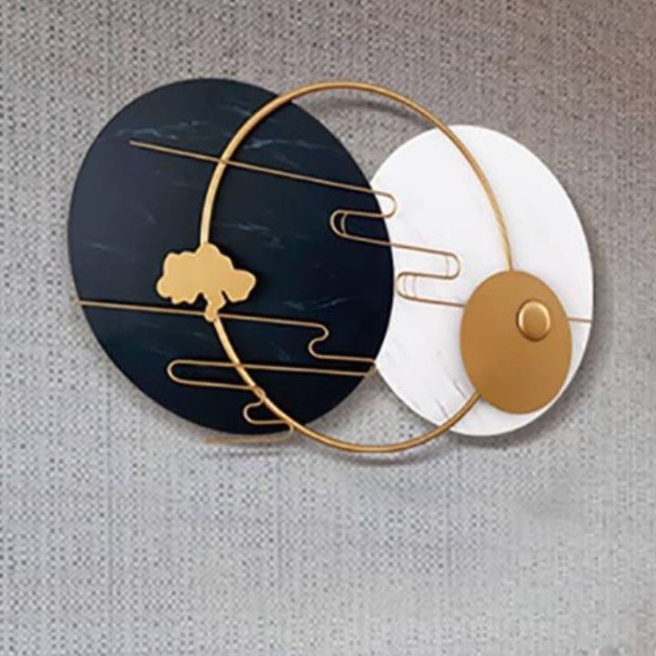 Metallic musical rings plates wall art by The Gharnish, modern wall decor with shiny, circular musical-inspired designs.