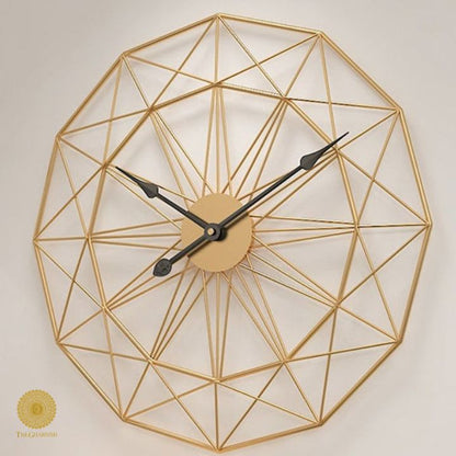 Large metallic geometrical wall clock by The Gharnish, 30 inches, with modern design and bold metallic finish.