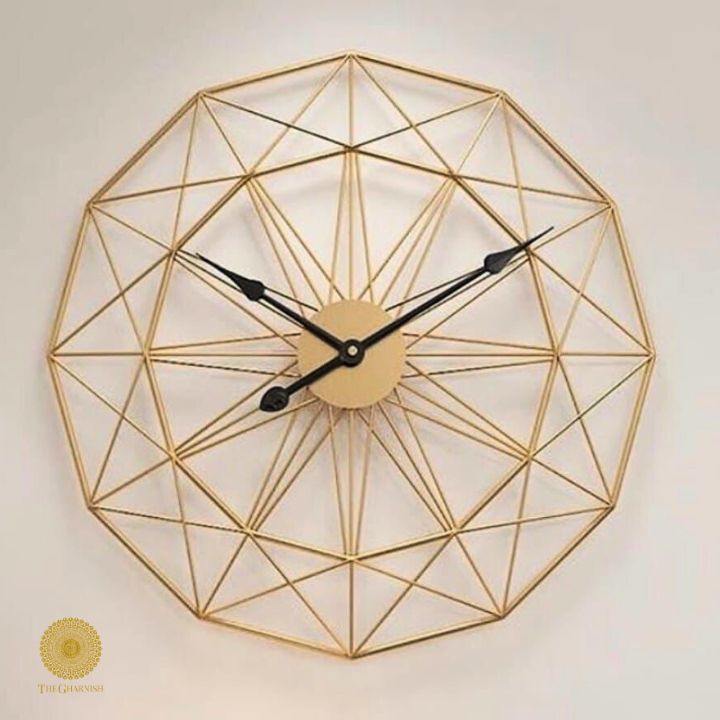 Large metallic geometric wall clock by The Gharnish, 30-inch round wall clock with modern metallic design.