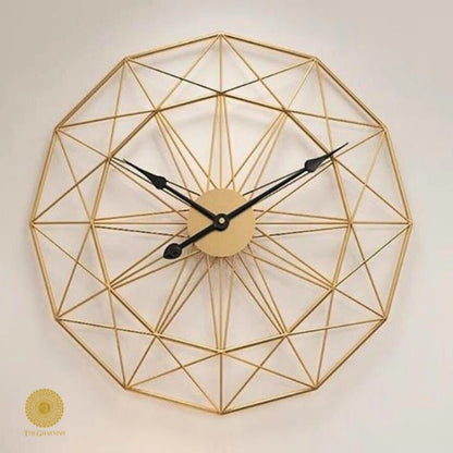 Large metallic geometric wall clock by The Gharnish, 30-inch round wall clock with modern metallic design.