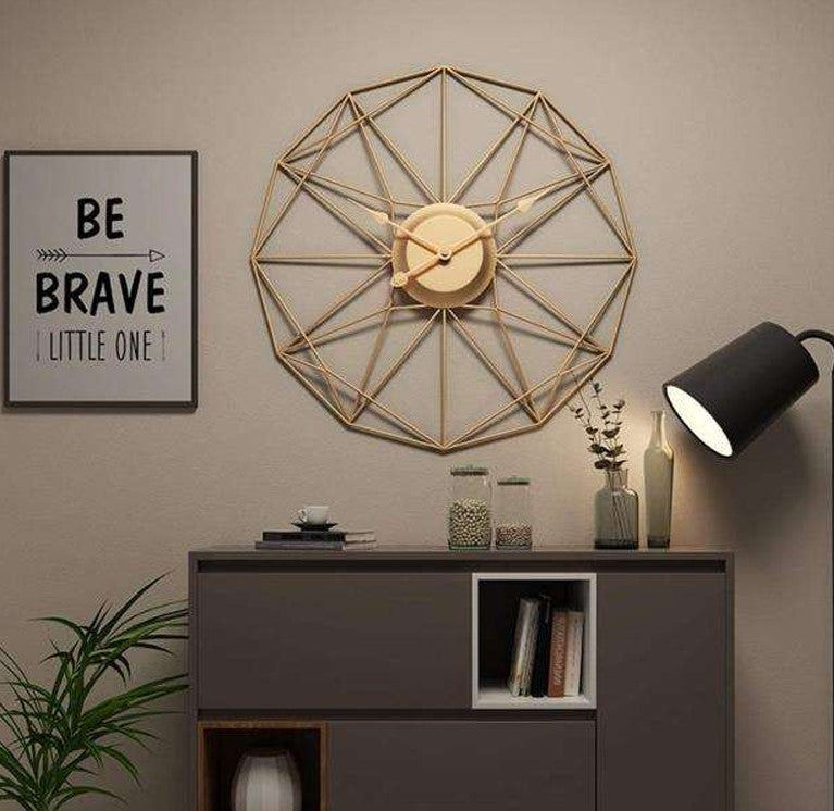 Large metallic geometrical wall clock by The Gharnish, 30 inches, with a modern, artistic design for wall decor.