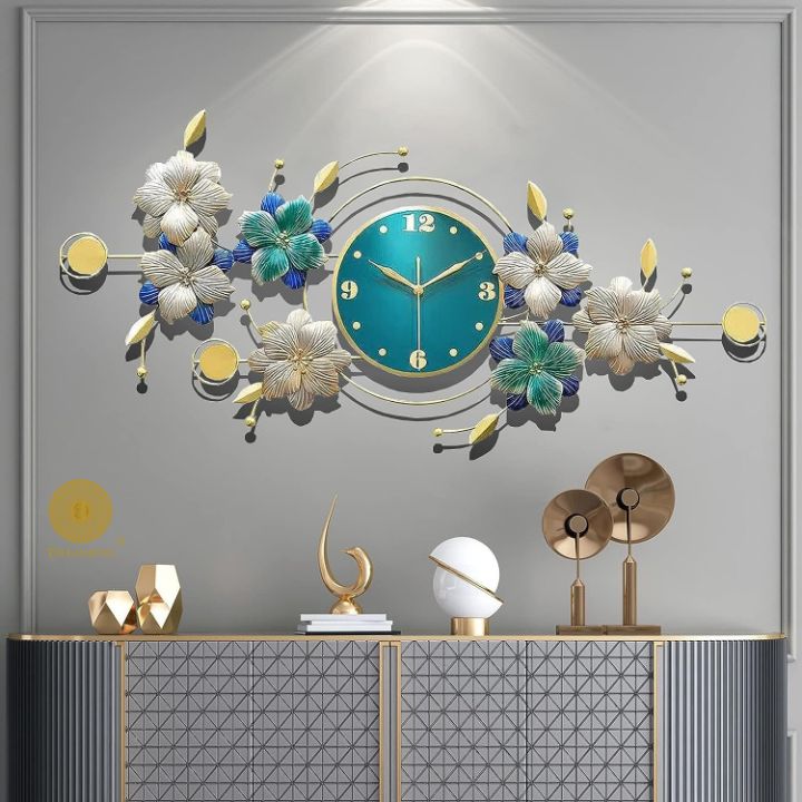 Beautiful flower wall clock by The Gharnish, 47x23 inches, featuring vibrant floral design on a decorative wall clock.