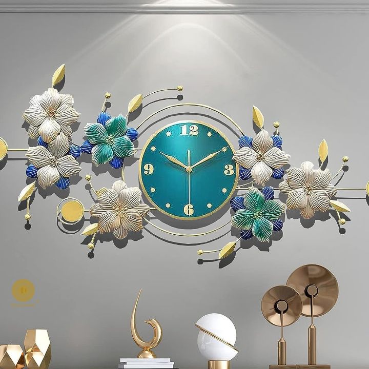 Beautiful flower wall clock by The Gharnish, 47x23 inches, featuring vibrant floral design and a modern wall clock style.