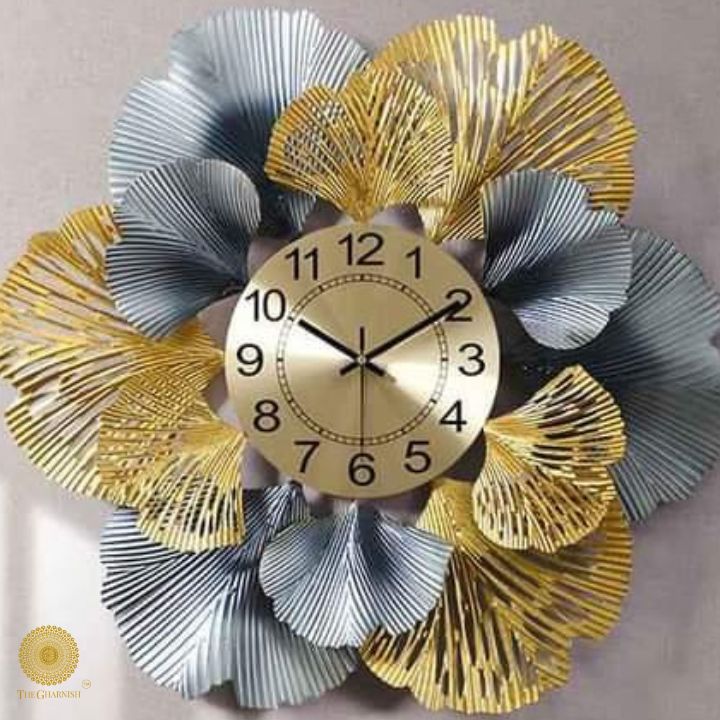 Metallic flower wall clock by The Gharnish, 24-inch round decorative timepiece with floral design for modern home decor.