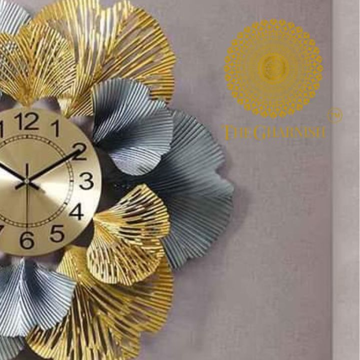 Metallic flower wall clock by The Gharnish, 24-inch round clock with floral design and modern metallic finish.