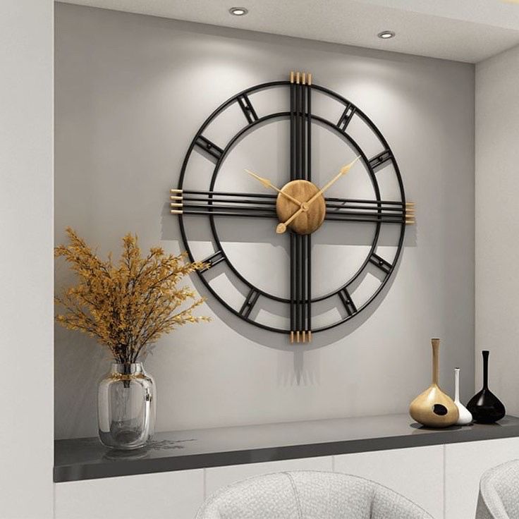 Modern black metallic wall clock with a ring design, 24 inches diameter, by The Gharnish, stylish and contemporary home decor.