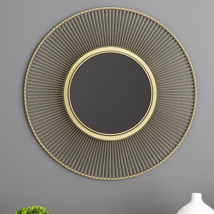 Metallic decorative wall mirror by The Gharnish, 24-inch round wall mirror with a modern metallic frame for stylish home decor.