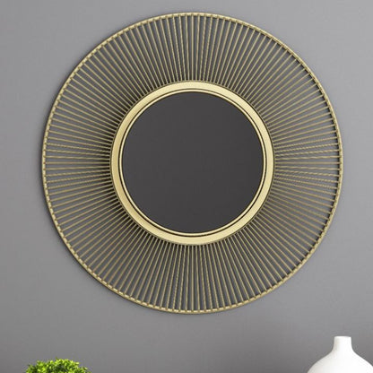 Metallic decorative wall mirror by The Gharnish, 24-inch round wall mirror with a modern metallic frame for stylish home decor.
