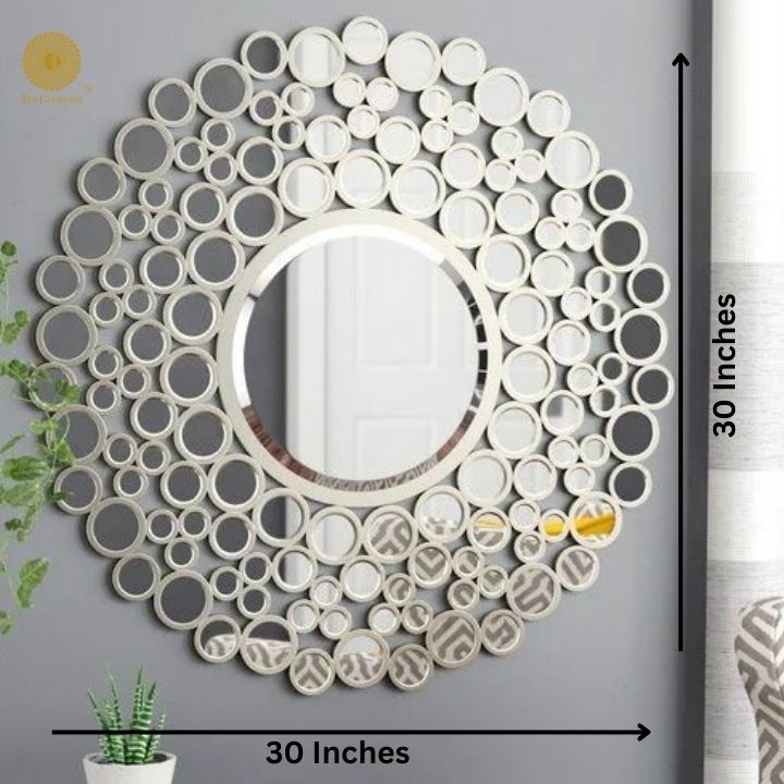 Silver multimirror wall mirror by The Gharnish, 24-inch round decorative mirror with multiple reflective panels.