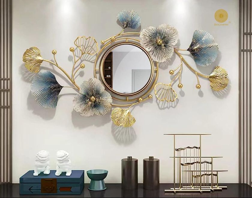 Designer flower and leaf wall mirror by The Gharnish, 40x18 inches, featuring intricate floral and leaf patterns for decorative wall decor.