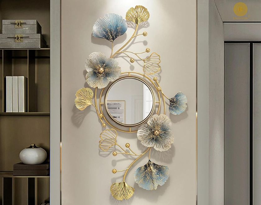 Designer Flower and Leaf Wall Mirror by The Gharnish, 40x18 inches, featuring intricate floral and leaf patterns in a decorative mirror.