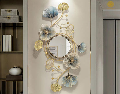 Designer Flower and Leaf Wall Mirror by The Gharnish, 40x18 inches, featuring intricate floral and leaf patterns in a decorative mirror.