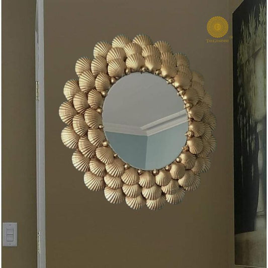 Elegant designer wall mirror by The Gharnish featuring a sleek, modern frame perfect for contemporary home decor.