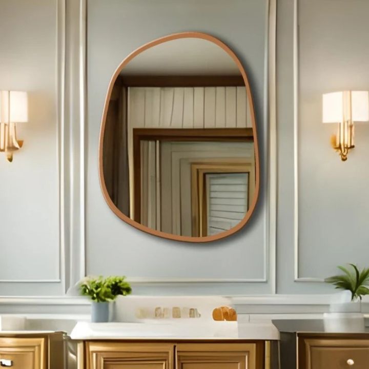 Irregular mild century golden wooden wall mirror with a unique frame design by The Gharnish.