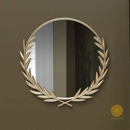 Metallic palm leaf wall mirror by The Gharnish, 24-inch decorative wall mirror with a stylish tropical design.