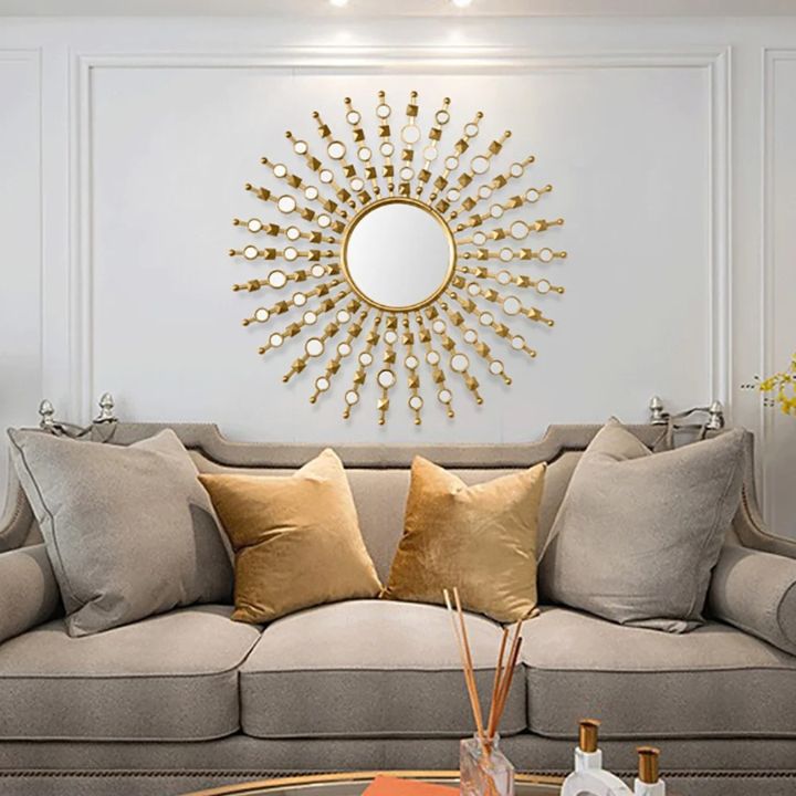 Stylish designer wall mirror by The Gharnish, 30-inch diameter with a modern frame, ideal for contemporary home decor.