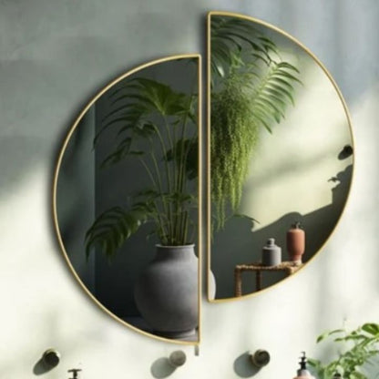 The Gharnish wall mirror with a unique, irregular shape and timeless design, reflecting modern elegance in a stylish home decor piece.