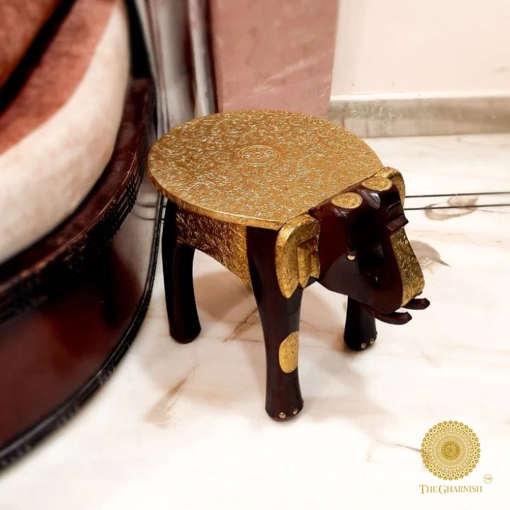 Rajasthani wooden elephant stool with brass plating, decorative wooden decor piece featuring intricate craftsmanship and vibrant finish.