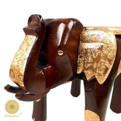 Rajasthani wooden elephant stool with brass plating, decorative wooden decor piece featuring intricate craftsmanship and traditional design.