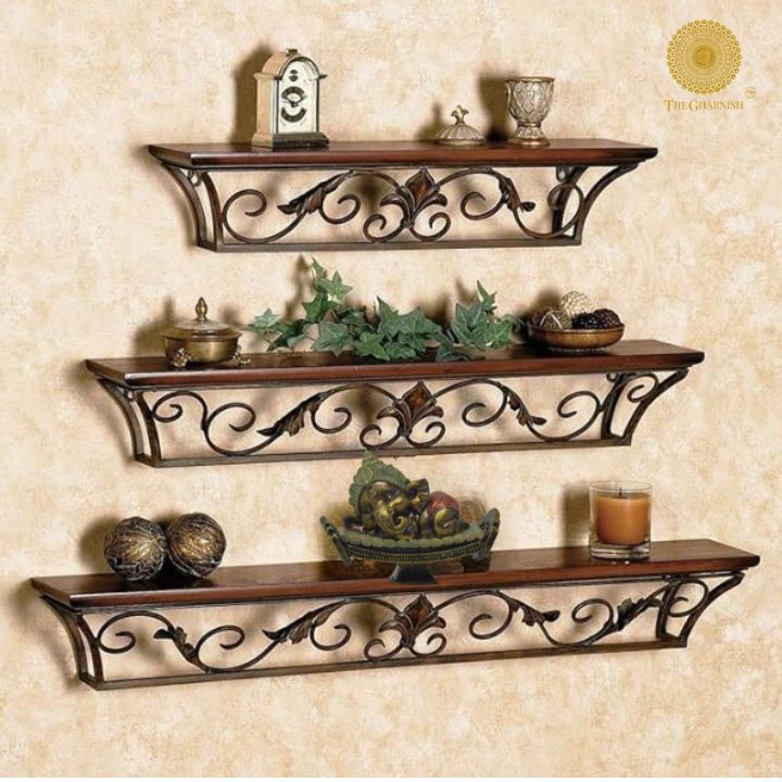 Wood and iron wall shelves from The Gharnish, featuring rustic wooden decor and sturdy metal brackets for stylish storage.