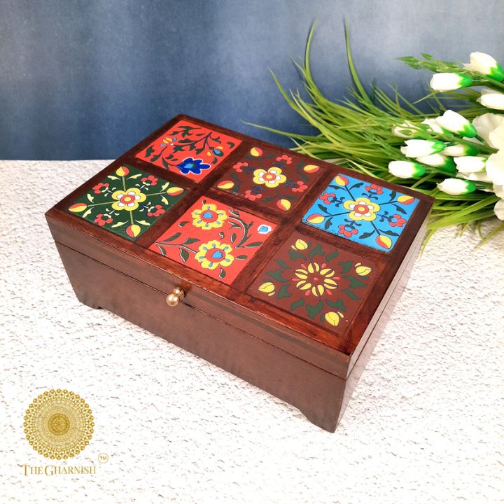 Wooden multicolor jewelry box from The Gharnish, featuring a decorative wooden design with multiple compartments for jewelry storage.