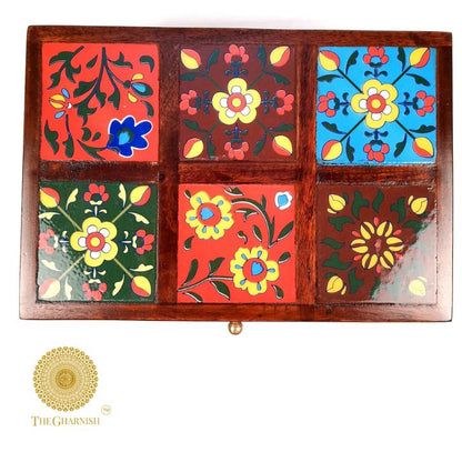 Multicolor wooden jewelry box from The Gharnish featuring intricate decor and multiple compartments for jewelry storage