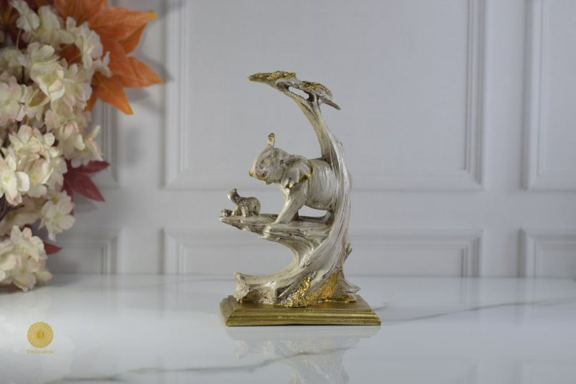 Elephant with baby figurine from TheGharnish, detailed animal figurine showcasing a mother elephant and her calf.