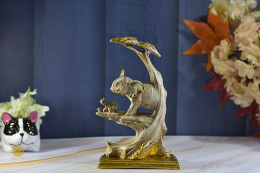 Elephant with baby figurine from TheGharnish, detailed animal figurine showing an adult elephant and calf in a natural pose.