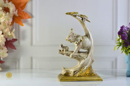 Elephant with baby animal figurine by TheGharnish, detailed ceramic sculpture of an adult elephant and calf.