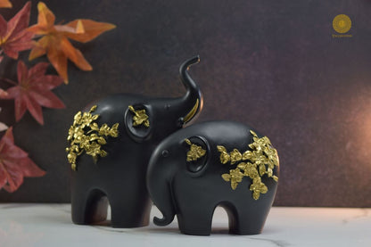 Premium pair of elephant animal figurines by TheGharnish, showcasing detailed, realistic resin elephants on a neutral background.