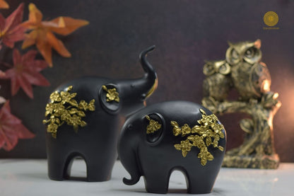Premium pair of elephant animal figurines by TheGharnish, detailed and realistic decorative sculptures for home or office decor.