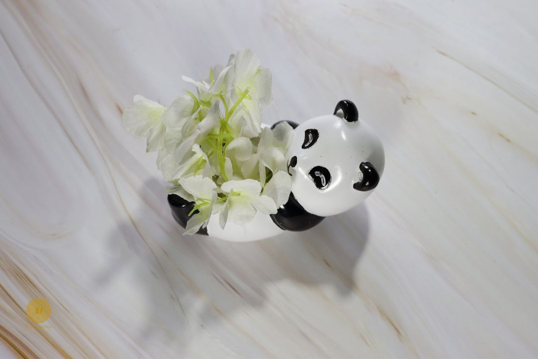 Detailed image of a panda miniature pot artwork by TheGharnish, showcasing a small panda-shaped decorative ceramic piece.
