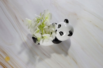Detailed image of a panda miniature pot artwork by TheGharnish, showcasing a small panda-shaped decorative ceramic piece.