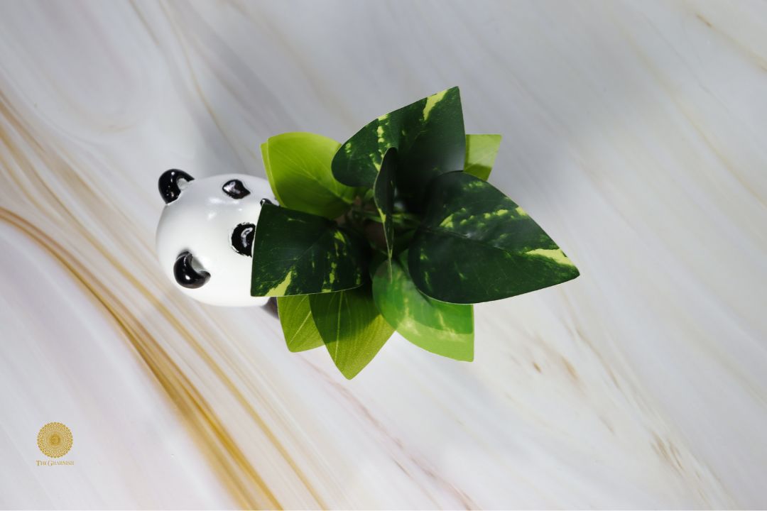 Miniature panda artwork pot by TheGharnish featuring a detailed panda design on a small decorative pottery piece.