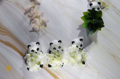 Miniature panda artwork by TheGharnish featuring a small, detailed panda figure in a decorative pot.