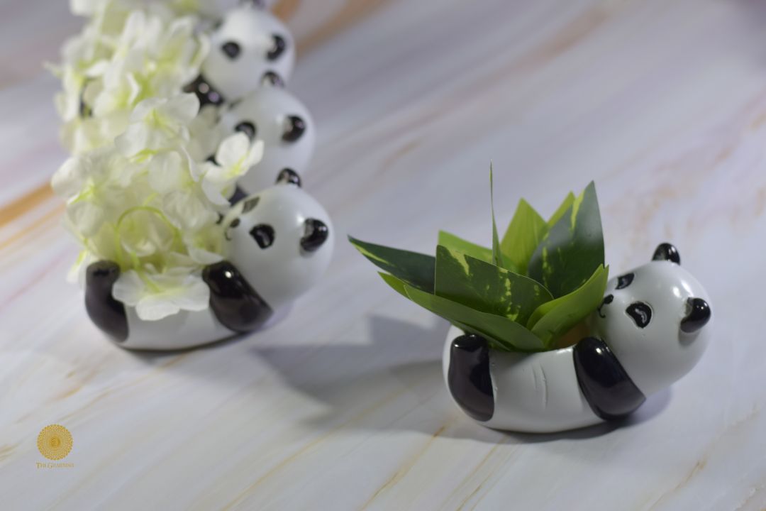 Miniature panda artwork pot by TheGharnish, featuring a detailed panda design in a small decorative ceramic pot.