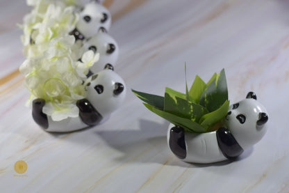 Miniature panda artwork pot by TheGharnish, featuring a detailed panda design in a small decorative ceramic pot.
