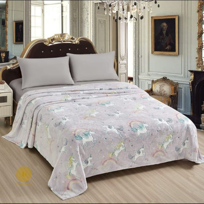 Glow in dark flannel blanket for kids by TheGharnish, soft bedding with glowing moon and star patterns in the image.