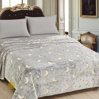 Glow in dark flannel blanket for kids by TheGharnish, soft bedding with luminous stars and moon design for cozy nights.