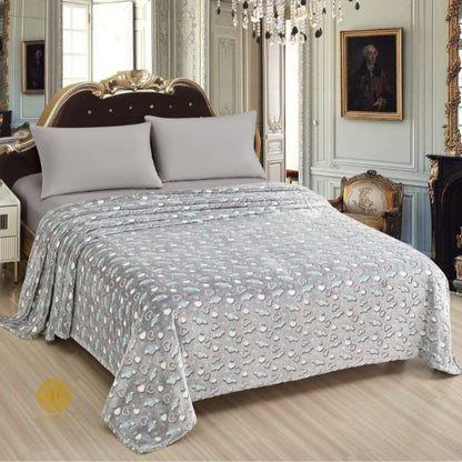 Glow in dark flannel blanket for kids by TheGharnish, soft bedding with luminous design, perfect for cozy nights.