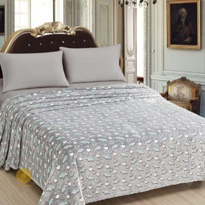 Glow in dark flannel blanket for kids from TheGharnish, soft bedding with glowing star patterns for cozy nighttime comfort.