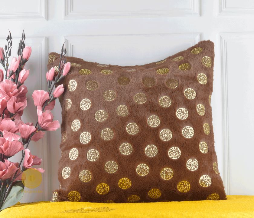 Set of two designer gold printed cushion covers by TheGharnish, showcasing elegant gold patterns on soft fabric cushions.