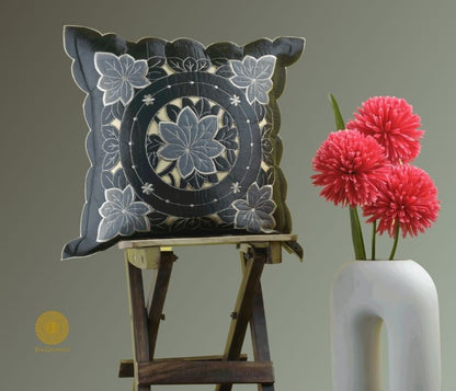 Set of two Silk Cut Work cushion covers by TheGharnish with intricate embroidery and soft fabric, perfect for decorative cushions.