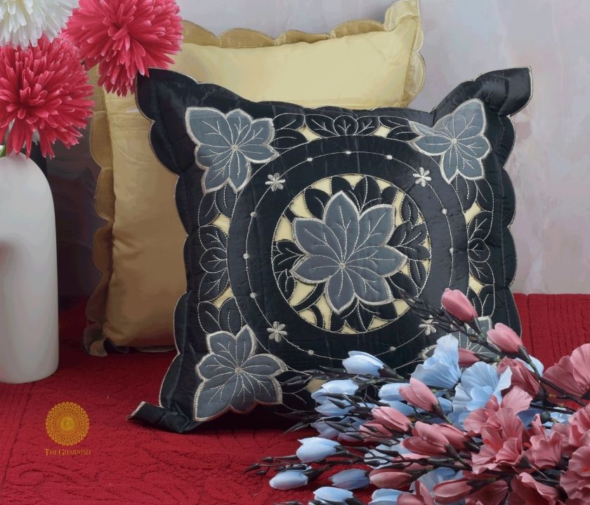 Set of two Silk Cut Work cushion covers by TheGharnish featuring elegant embroidered silk cushions with intricate cutwork.