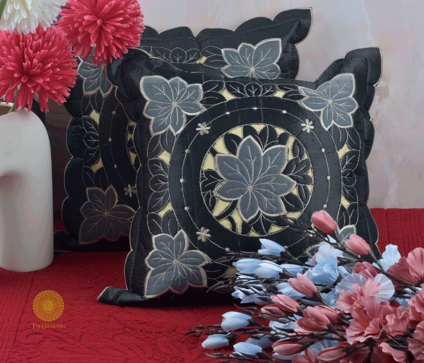 Set of two Silk Cut Work cushion covers by TheGharnish featuring intricate embroidery and elegant silk fabric.