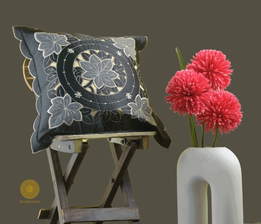 Set of two Silk Cut Work cushion covers by TheGharnish, featuring intricate cut work designs in elegant fabric.