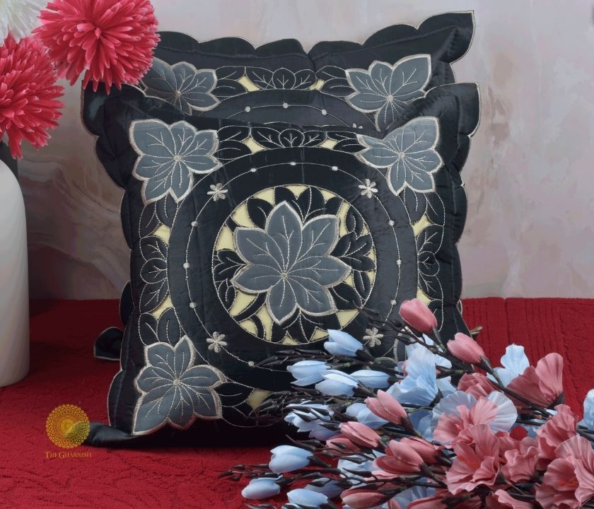Set of two Silk Cut Work cushion covers by TheGharnish featuring elegant embroidered cushion covers with intricate cut work design.